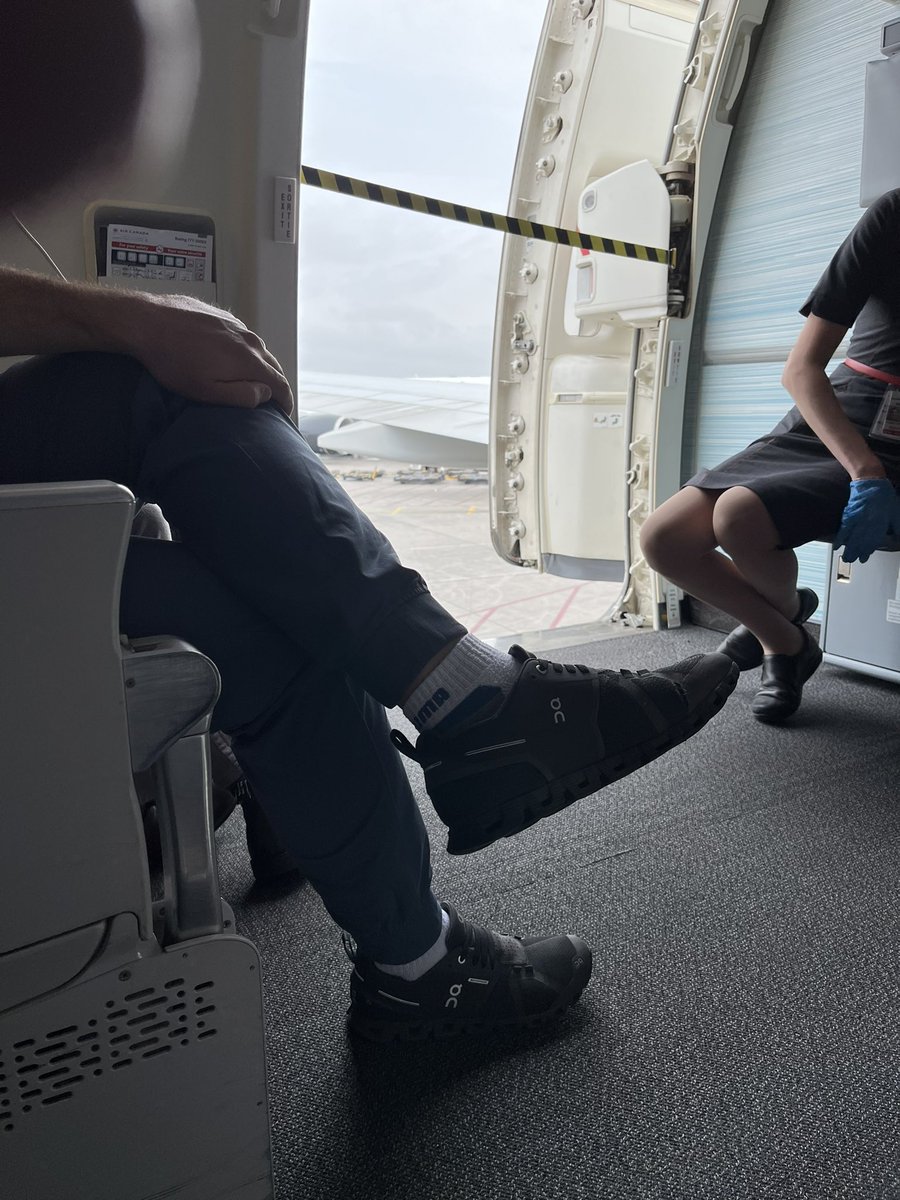 LisaHDornan's tweet photo. Delayed and plane is hot and stuffy - thank-you to the flight attendants for taking the initiative to cool things down by opening a door. Hope tempers cool down too - people on this flight are losing their minds and it’s not even 9 am ET. Yikes! https://t.co/F96TsxIiV2