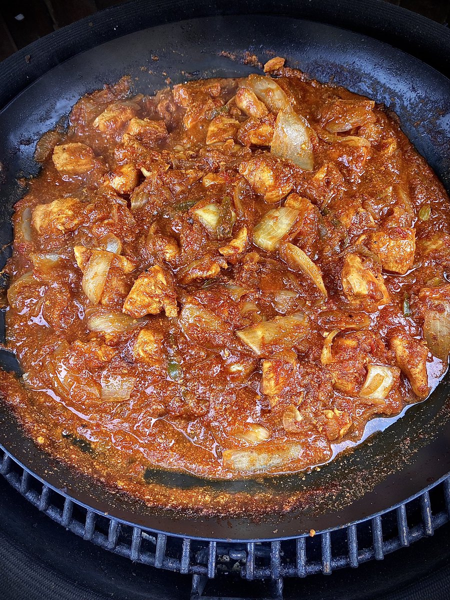 When cooking a chicken dopiaza the more onions the better.. Outdoor cooking on the #Kamadojoe #teamred @leonrestaurants curries cookbook 🔥🔥🥵