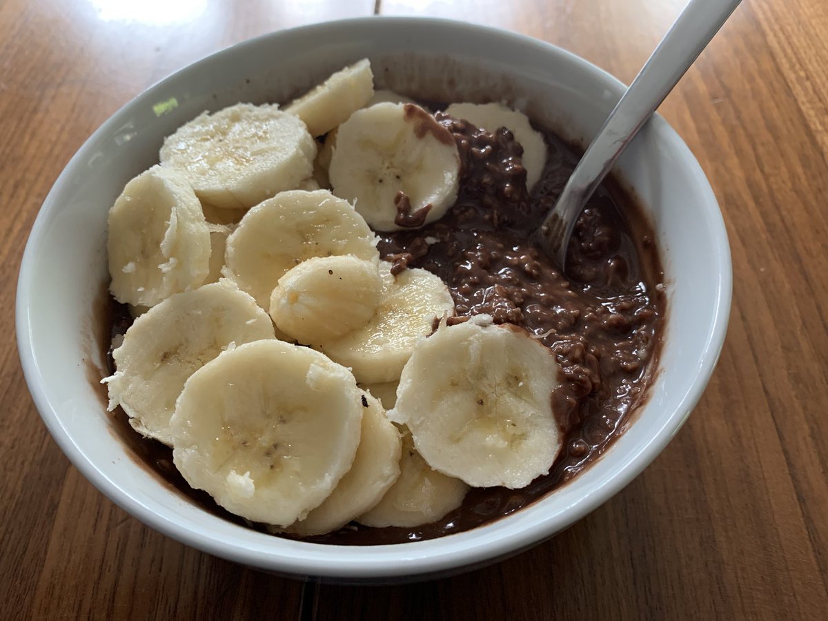 Breakfast this morning: oatmeal with chocolate tahini spread mixed in, topped with slices of banana-that-realistically-needed-to-get-eaten-today.