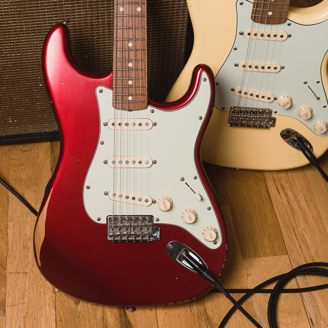 Outfitted with period-correct components, Pure Vintage ‘59 Strat pickups, and a custom Candy Apple Red finish, this CME Exclusive @Fender Vintera Road Worn ‘60s Strat looks as if its been pulled from the pages of history! Get it at CME! bit.ly/43ZEAHN