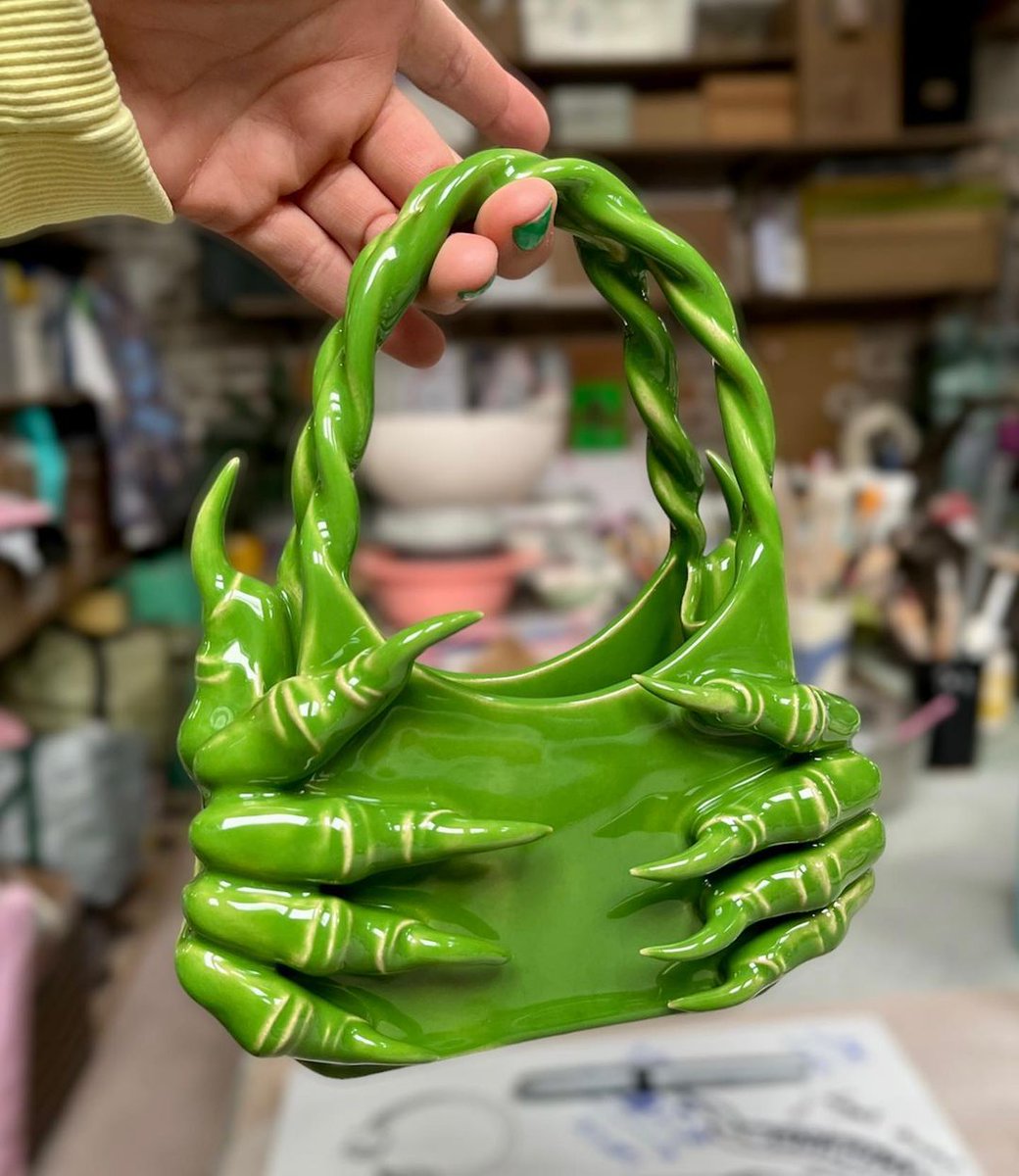 Above Pic 1: Medium Bag in sandstone ceramic enamel with matte metal effect.

Above Pic 2: Sandstone Ceramic Bag with 4 paws, shiny red enamel, and synthetic fur handle.

📸: @/andysimonstudio .

Below Pic: “My Little Green Monstrous Bag” from Fritto Misto exhibition at IRL.