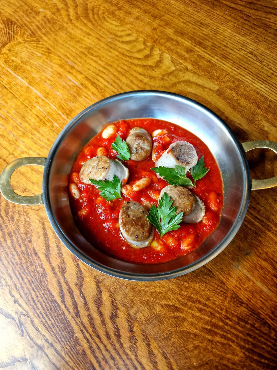 On special tonight….Botifarra sausage with roasted piquillo peppers and a white bean stew