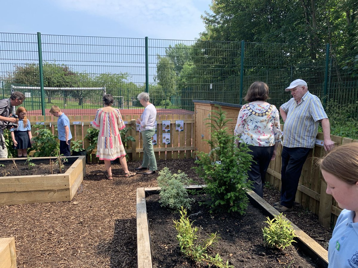 Comberps's tweet photo. Our Eco Council welcomed some VIPs to the official opening of the CPS allotment this afternoon. We were delighted to show them all the wonderful plants growing all over the planting beds. Many thanks to all our supporters from the local community. https://t.co/XeuSz5Ql2l