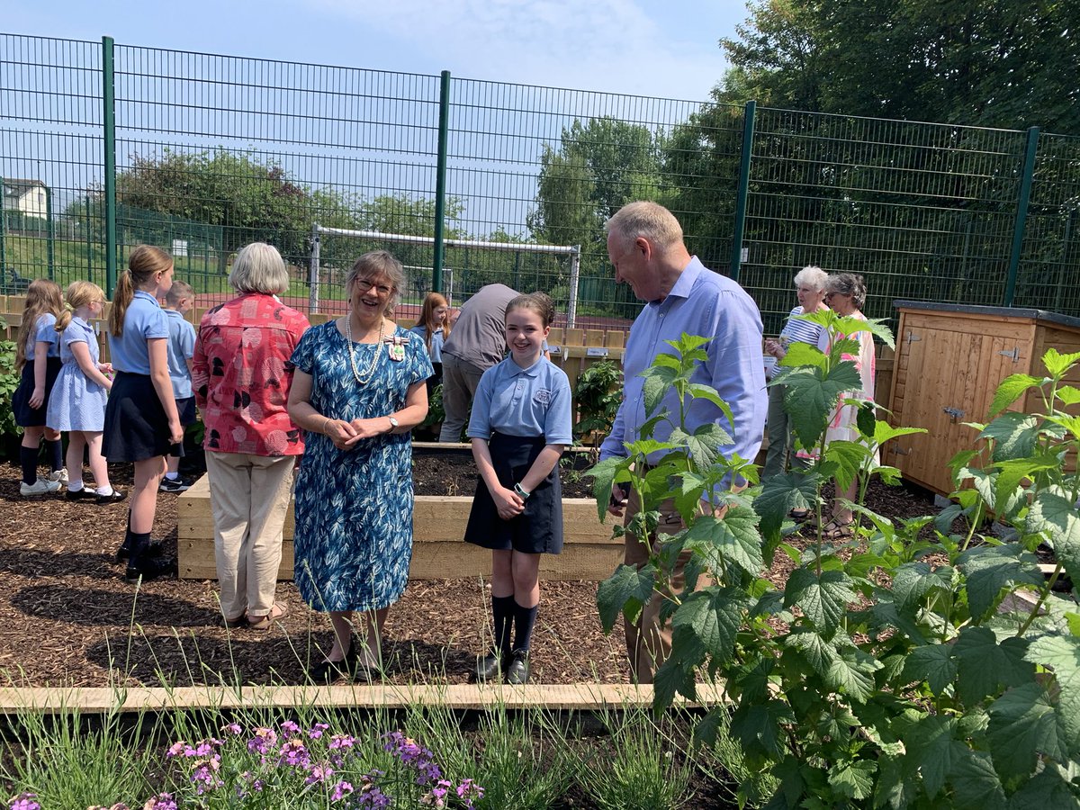 Comberps's tweet photo. Our Eco Council welcomed some VIPs to the official opening of the CPS allotment this afternoon. We were delighted to show them all the wonderful plants growing all over the planting beds. Many thanks to all our supporters from the local community. https://t.co/XeuSz5Ql2l