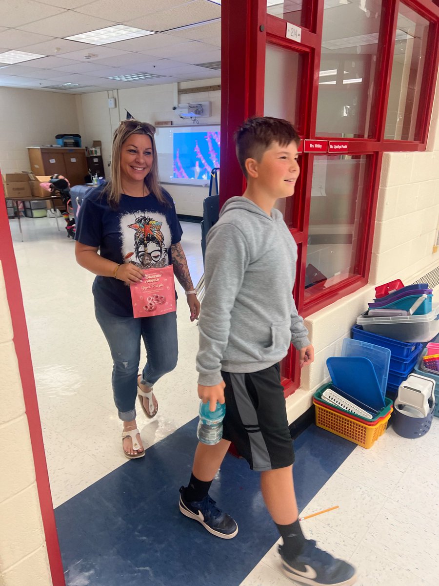 natalie047's tweet photo. One last hallway walk with my sixth grader.. I’m going to miss our talks and our spider friend pepperoni in the D pod 🤪 https://t.co/VCicio7hPx