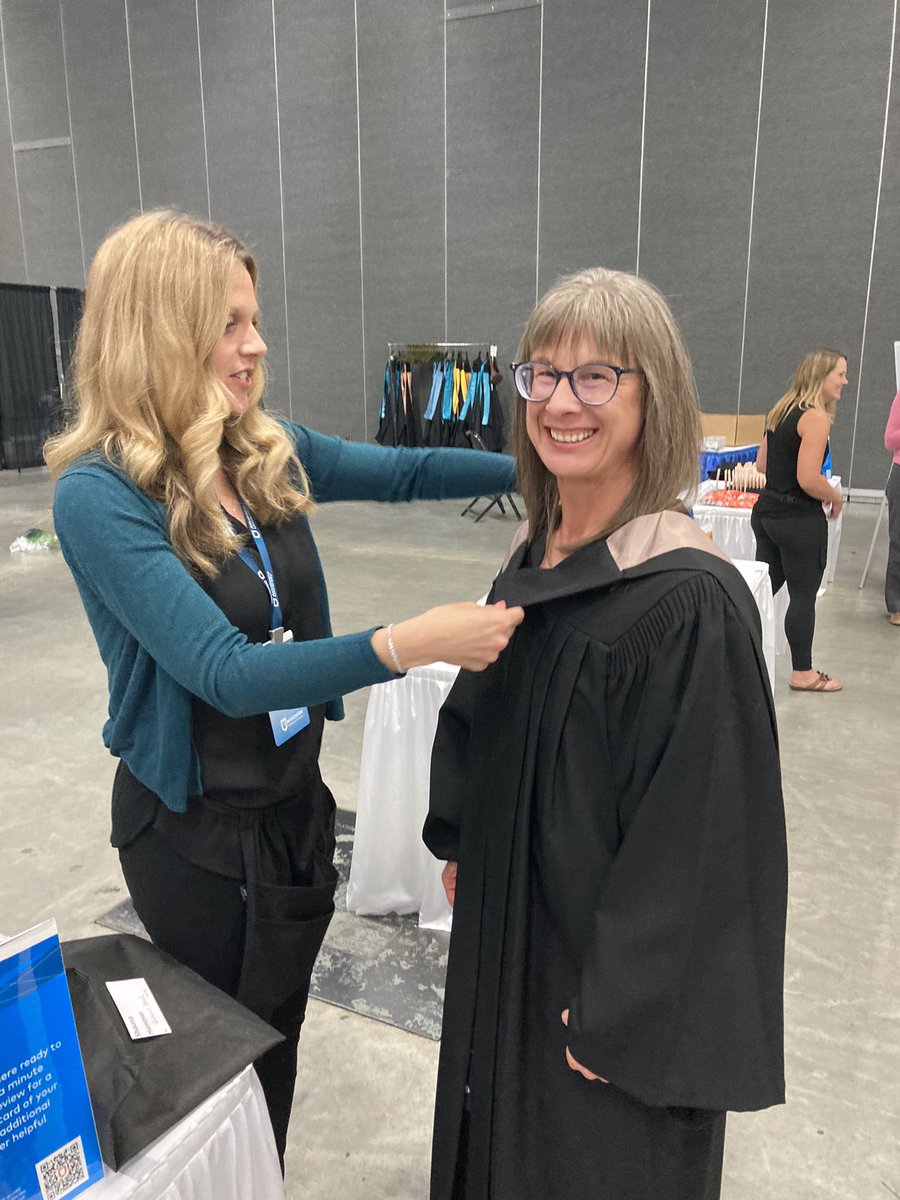 Our 2023 business graduates are getting ready for their convocation ceremony this afternoon! 
Pictured is BMgmt grad Shannon Hammer, donning her gown and hood 👩‍🎓

Congratulations to all our grads! 
#AthabascaUGrad