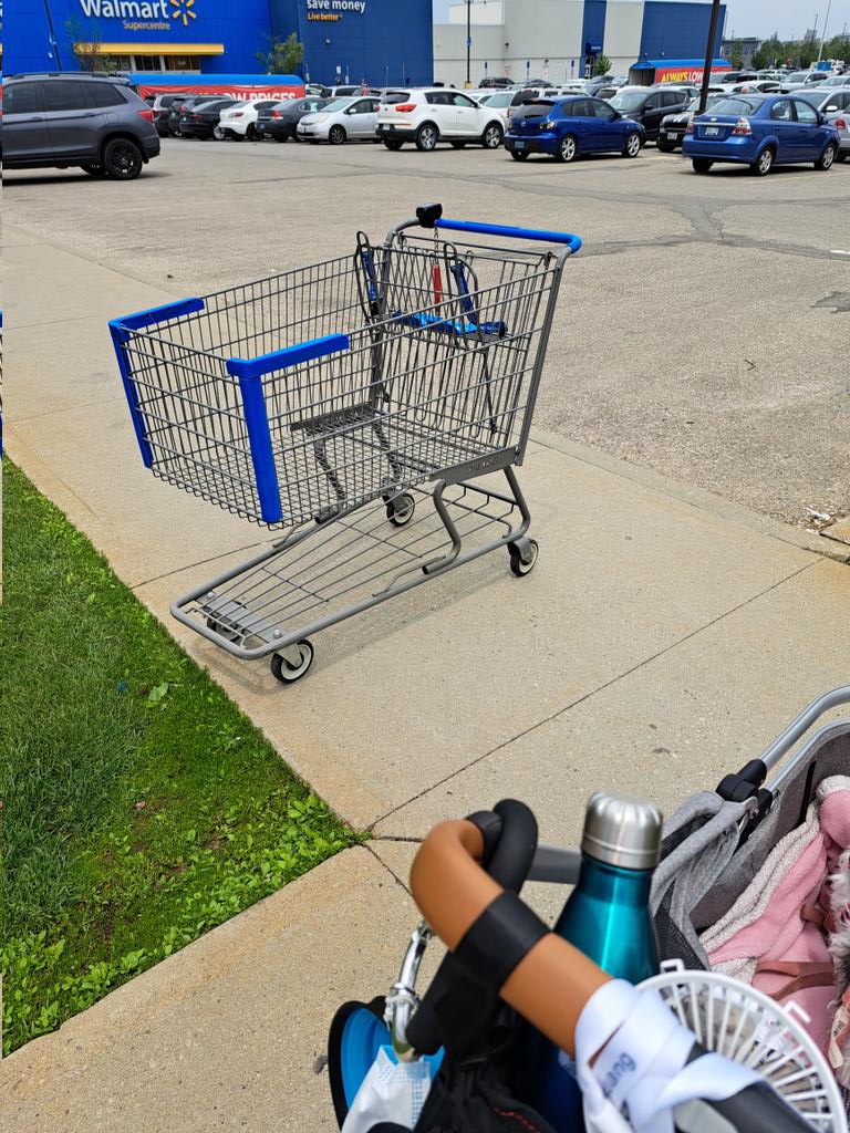 Please don't do this. People using mobility aids need clear sidewalks to navigate the world. If you don't want to bring your cart back, at least push it off the sidewalk. #DisabilityTwitter #ableism #disability