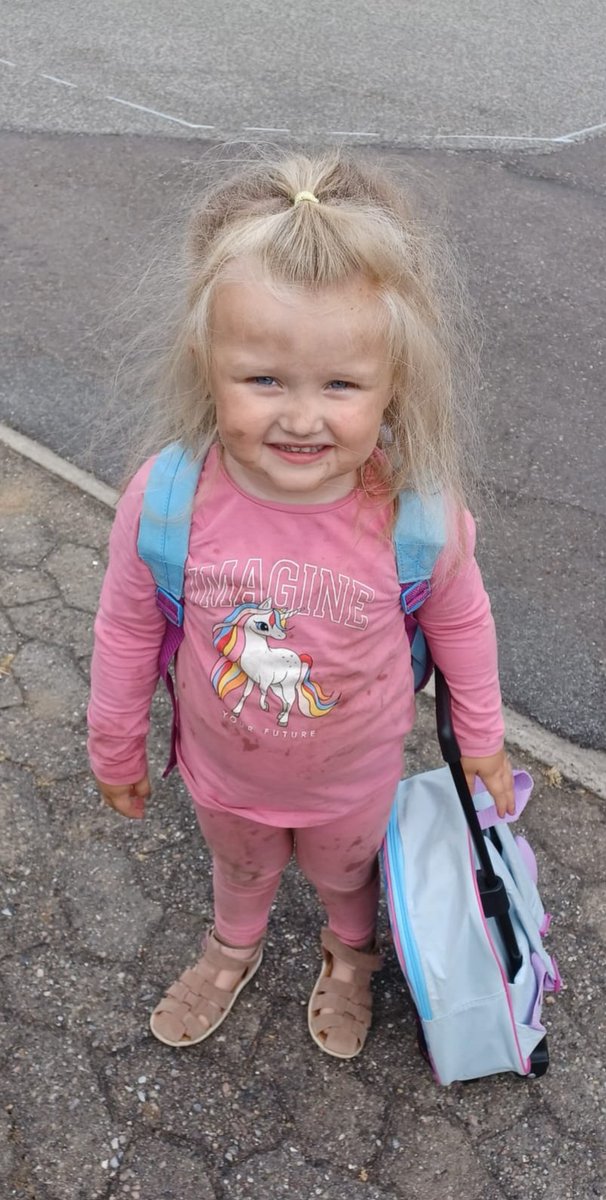 My little girl looks like she's spent the day fighting in the trenches,
That or she just had a lot of fun at kindergarten.