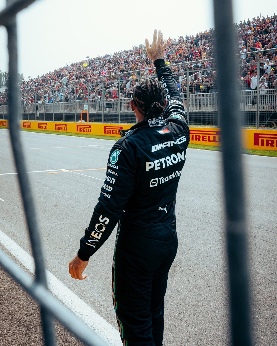 MercedesAMGF1's tweet photo. Heading out to see the fans during the red flagged FP1. 💜👏 https://t.co/RL3eEybab7