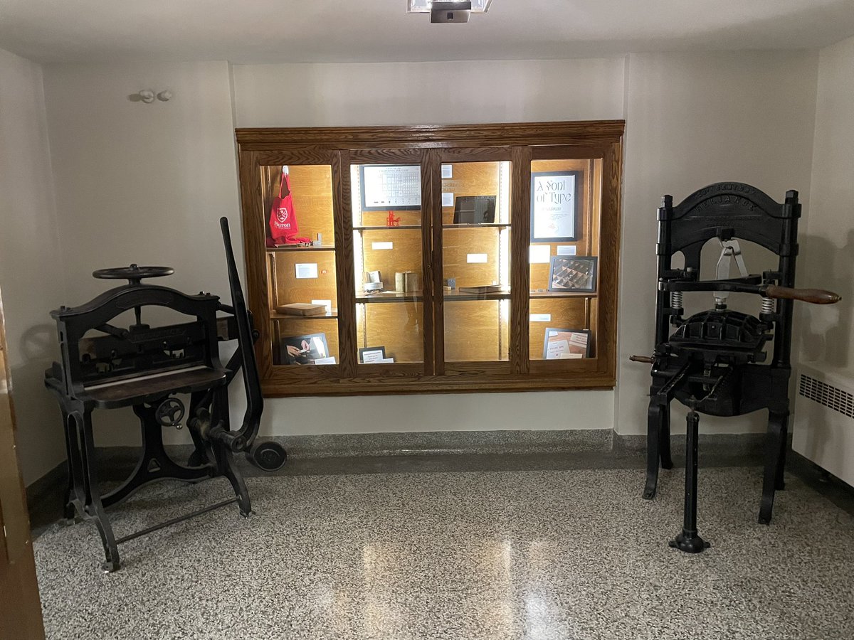 Our #Letterpress exhibit @huronatwestern is now complete. To make space in the studio this afternoon we moved our “small” Reliance Press out into the hallway beside our Reliance paper cutter. #bookarts