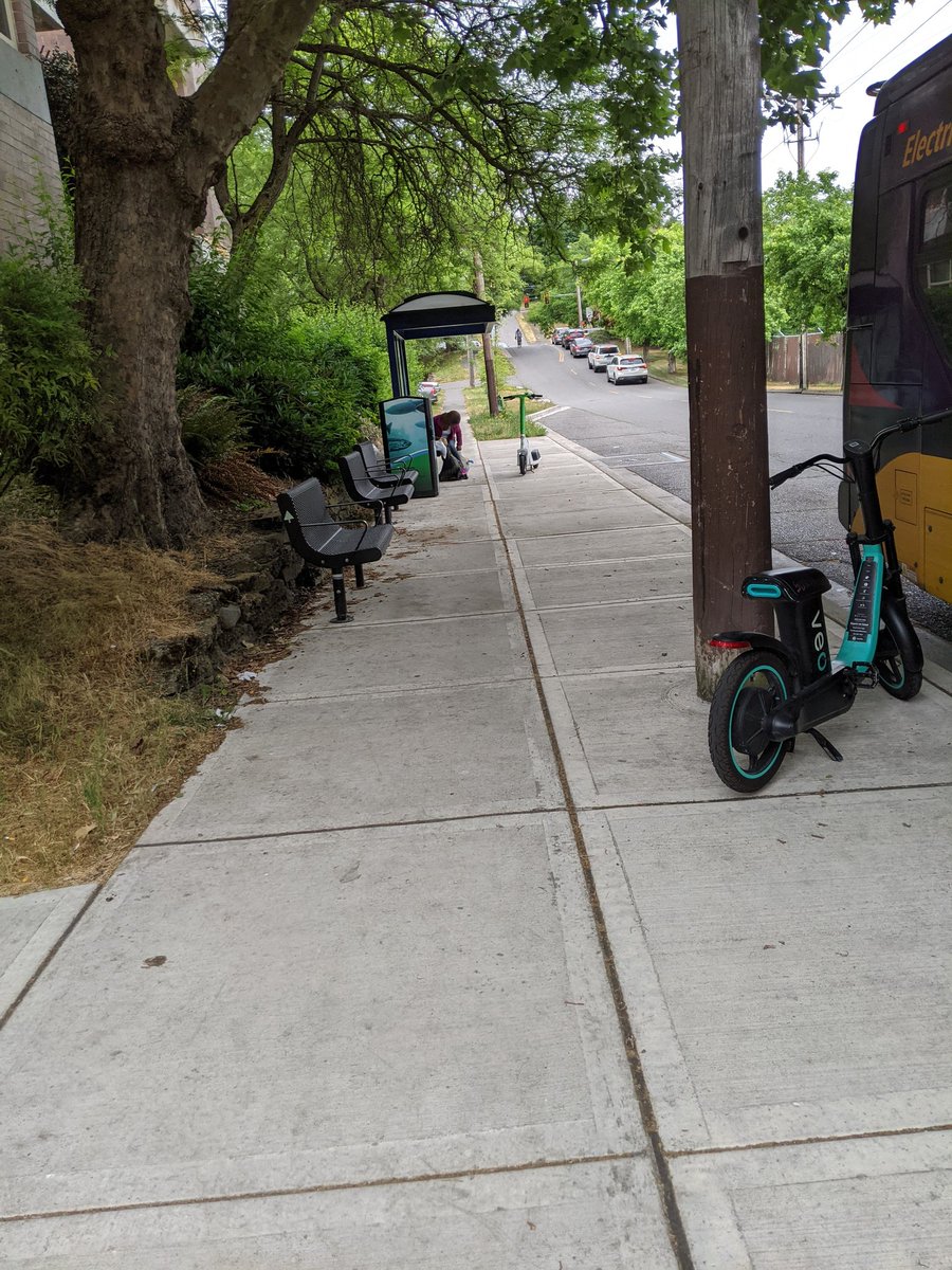 AmbassadorThwa1's tweet image. Grumble of the day #Bikeshare #FindItFixIt #walkability 
@seattledot @non_drivers 
How not to park vehicles. Read the alt text or tell me why you can't