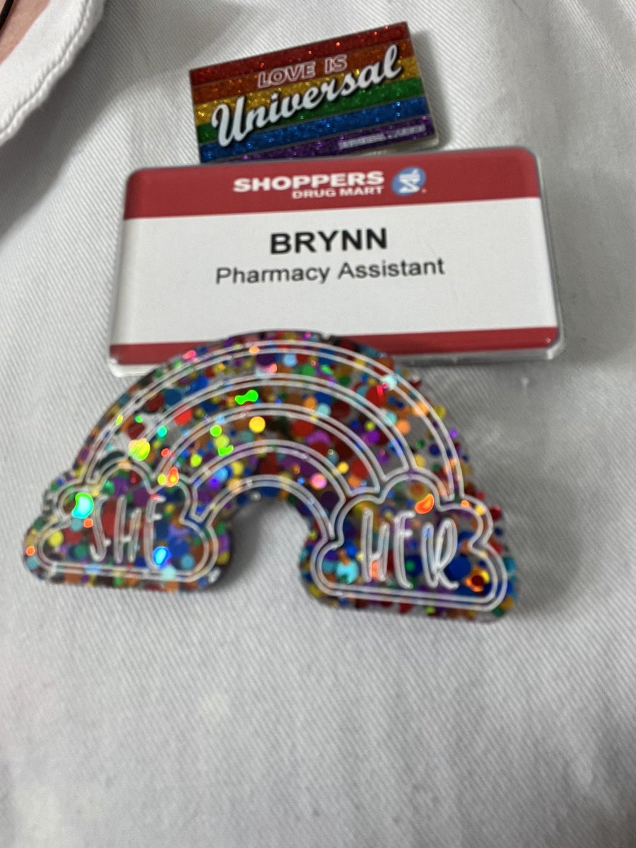 Rockin my new pronoun pin at work!! Thanks @lillimunstarr #PrideVibes @ShopprsDrugMart #PharmacyLife