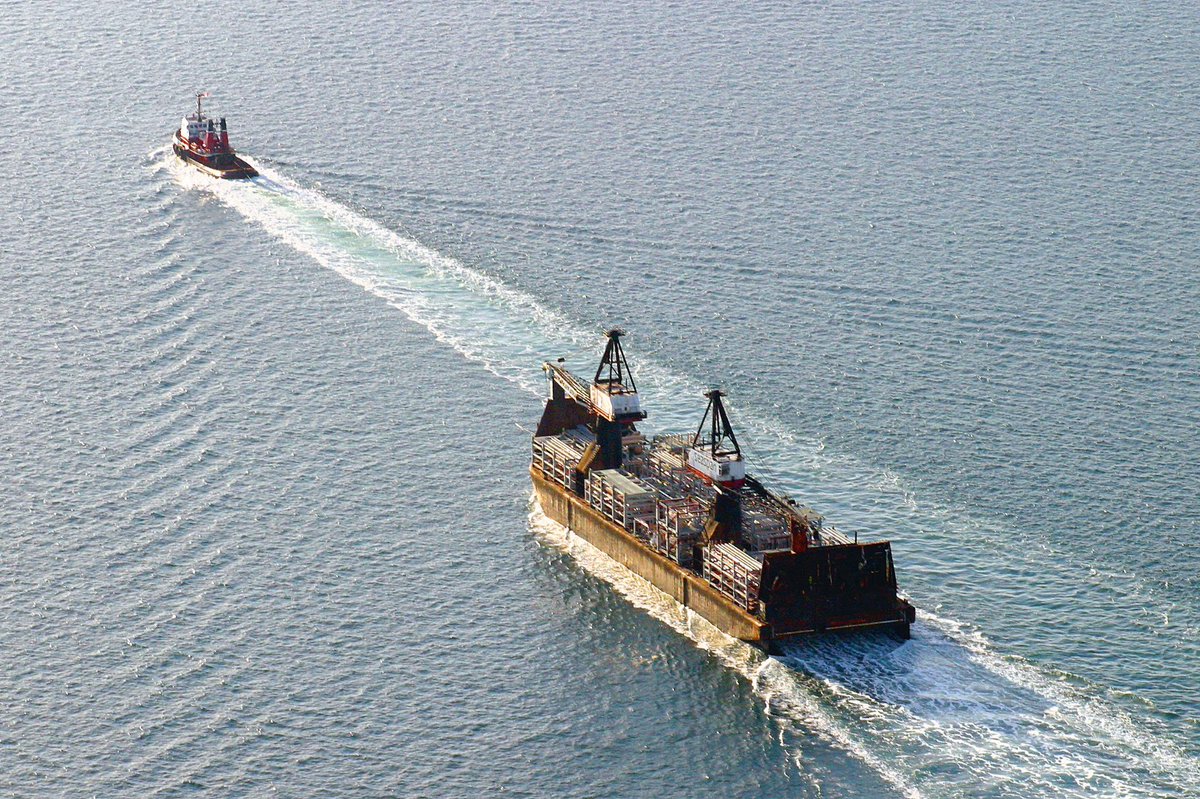 #FlashbackFriday - Feb. 2004 and the time @Seaspan repurposed the self-dumping log #barge #Seaspan Forester as a cargo platform for parts of an emissions reduction system for a petroleum plant in the San Francisco Bay Area. Her #tug was the Seaspan Commodore. #ships #boats #tugs