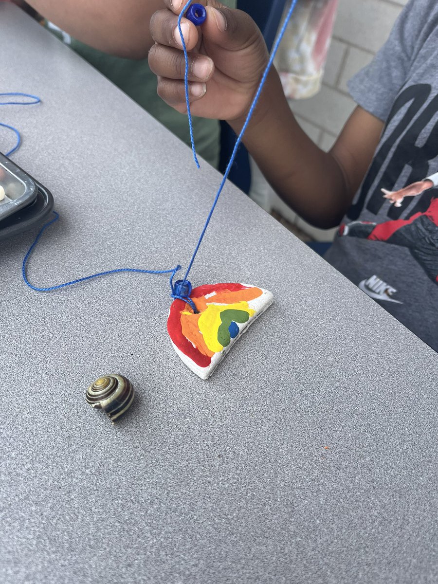 Nothing like making rainbow necklaces in the sunshine. They made salt dough, cut the shapes, painted and the added the beads! 🌈 This is a great June tradition - a few kids still have theirs from last year! @DesmondHDSB *Check out the snail watching? 🐌