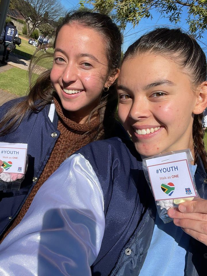 High School girls being celebrated by their teachers for Youth Day. #WalkasOne