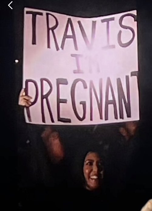 Kourtney Kardashian announces she’s pregnant by surprising Travis Barker with a sign at his show:

“Travis I’m Pregnant”