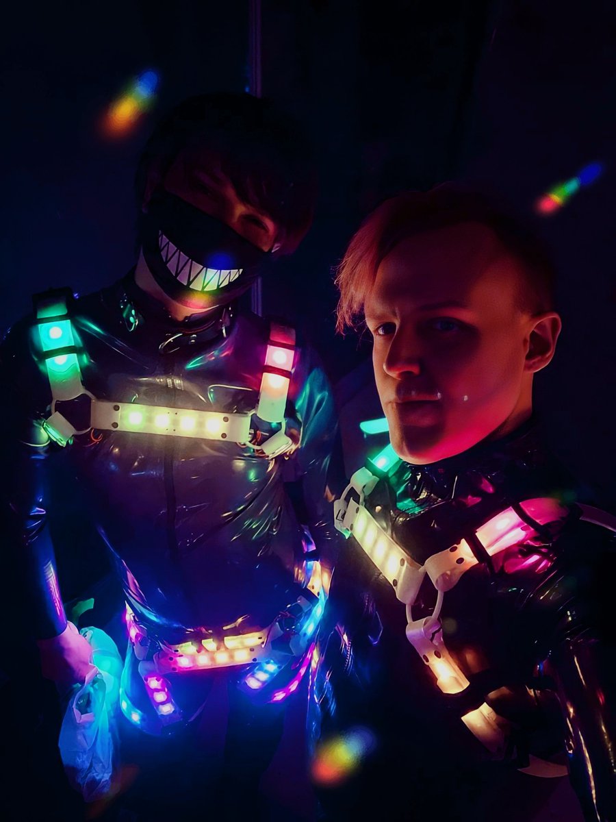 RubberlyChannel's tweet photo. Throwback to Vivid Sydney 2022! Wrapped in latex and lighting up the  night with our LED harnesses. Filming nights are the best nights!  #VividSydney #Rubberly #LatexLove #LEDLights https://t.co/xrp0MaZufM