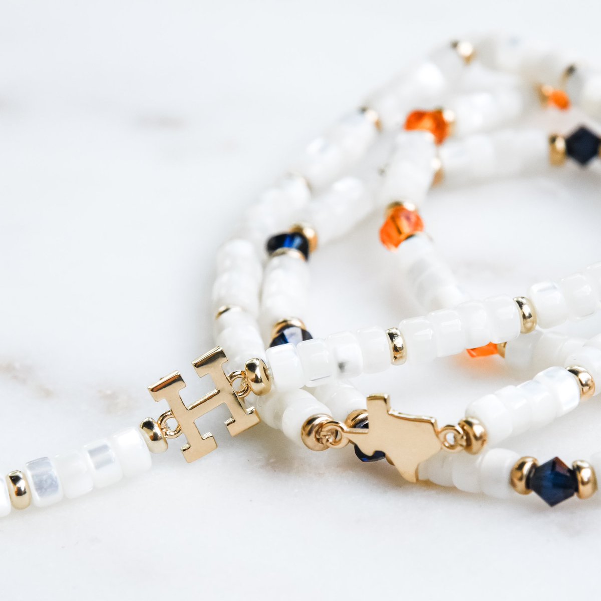 ShopJenCampana's tweet photo. The #HOUvsTEX #SilverBoot series is underway in Arlington.  Check out our new Block H Mother of Pearl bracelet, available now at https://t.co/iruzitgQKW ~ an elegant way to show your love for #HTown! #Houston #Texas #Astros #GoStros #Ready2Reign https://t.co/YOmpMsMehy