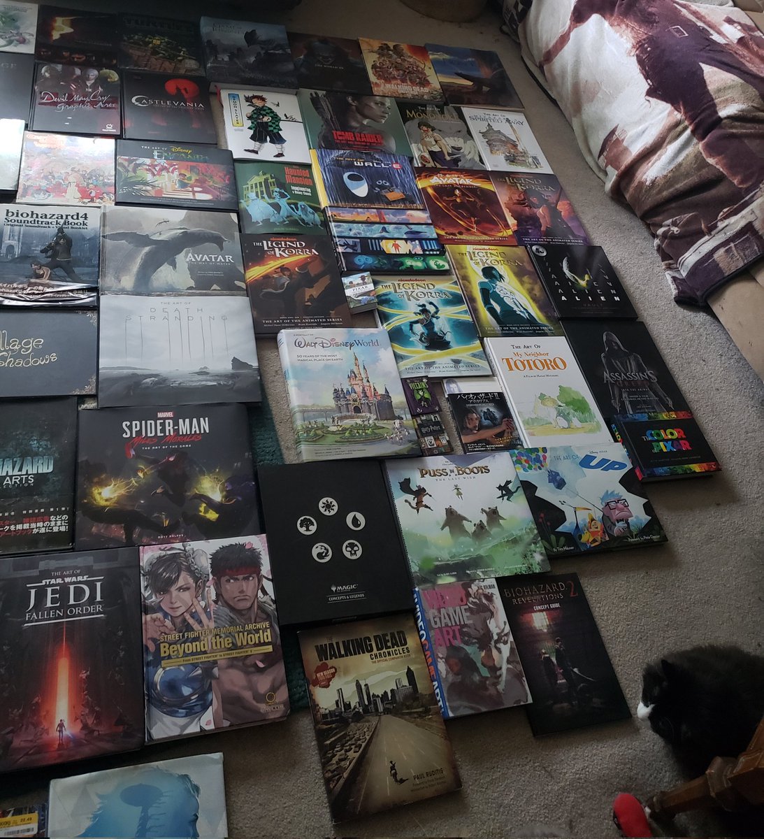 EllynResident's tweet image. Alright here we go. Here is my complete collection of artbooks relating to gaming, film, and of course Resident Evil. It is a very loose interpretation of artbooks but in total 115 books