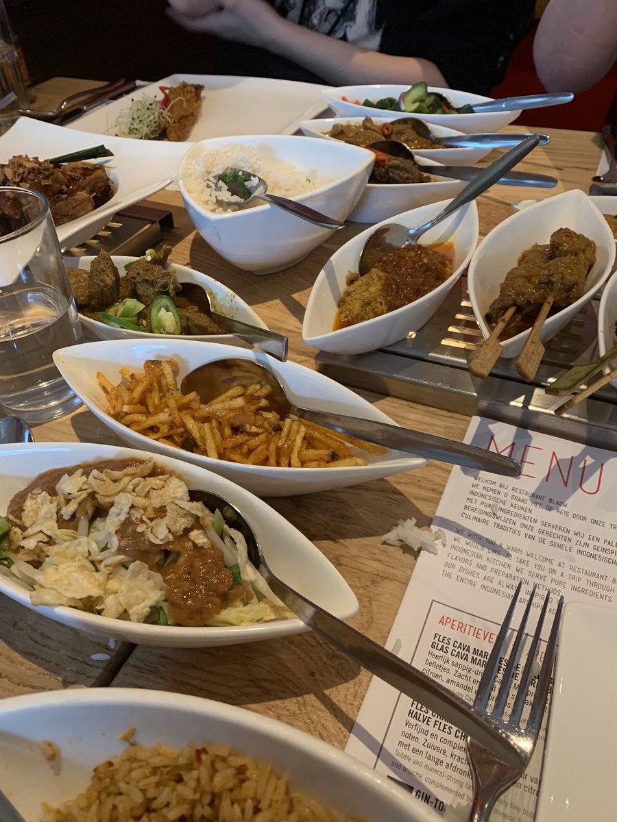 Hackknife's tweet photo. The specialty of Restaurant Blauw in Amsterdam is Indonesian.  We had a delicious kepiting goreg (softshell crab) to start and the missus &amp; I opted for the rijsttafel (rice table), an astounding array of meat, fish, and veggie dishes - a unique treat not often seen in the US https://t.co/7qeGDt2g0u