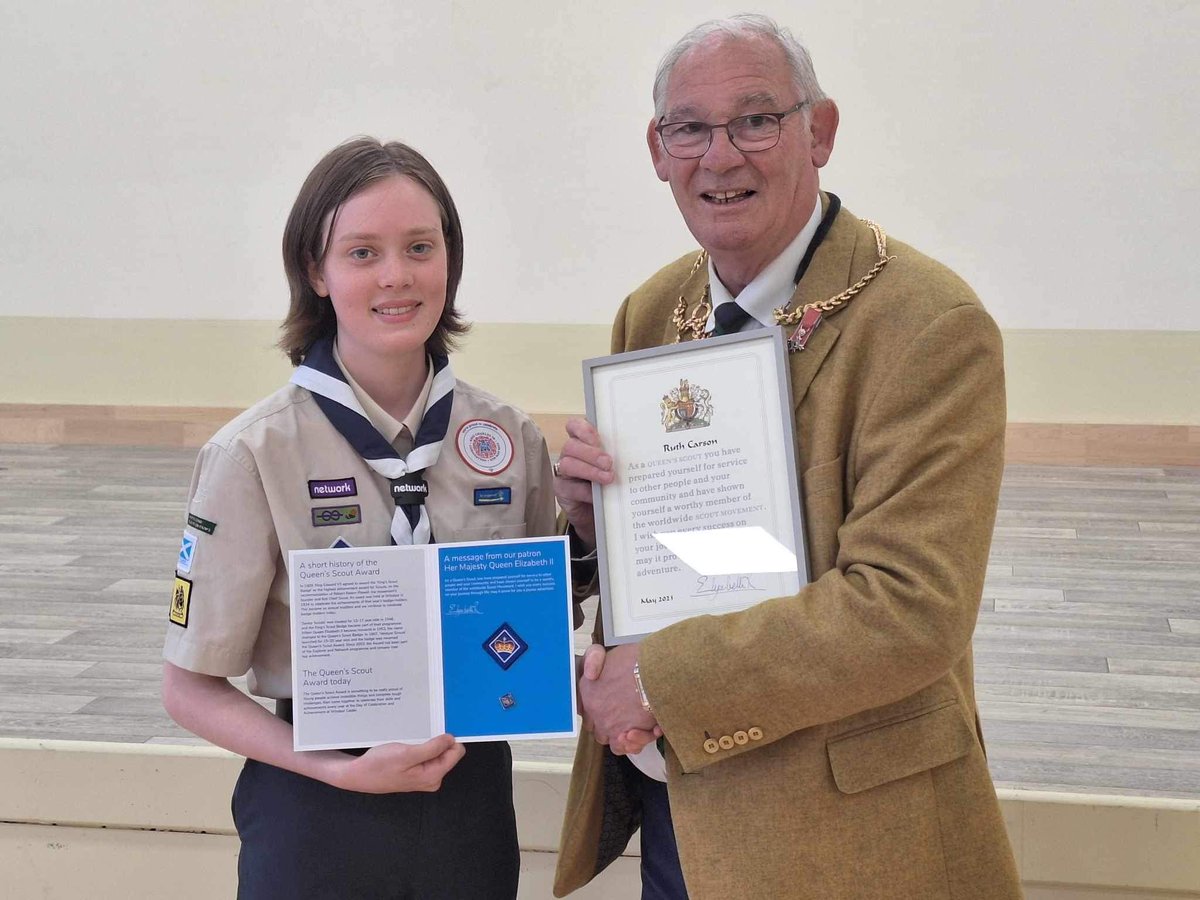 What a historic moment! The final ever Queen's Scout Award presented to Ruth Carson of 11th Fife by Fife Provost Cllr Jim Leishman, himself an ex-Scout. Ruth now has the treble with her Queen's Guide Award and Duke of Edinburgh Gold Award.  Huge congratulations. @ScoutsScotland