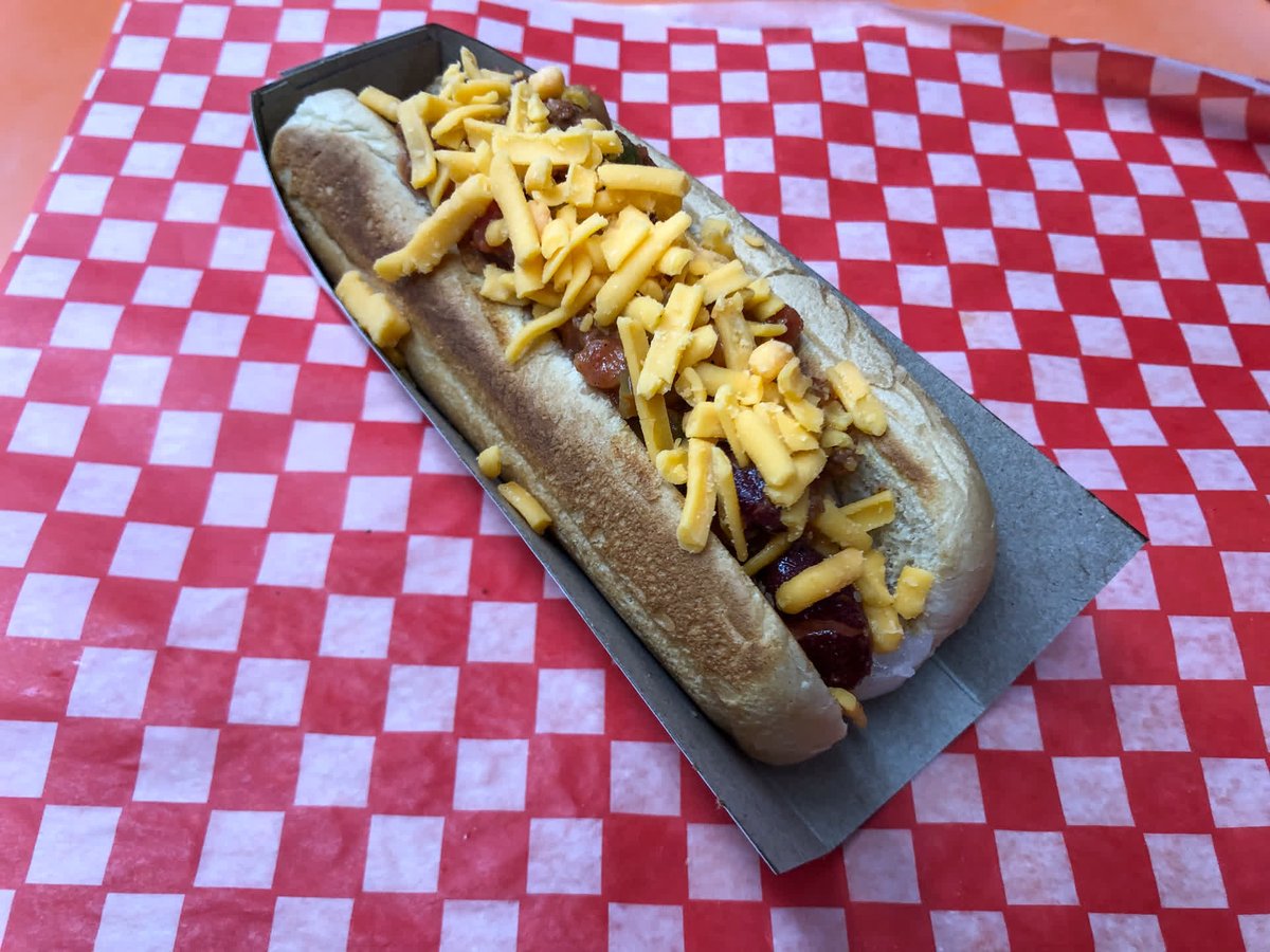 Spice up your taste buds with our fiery Fritzies chili cheese hot dog! 🔥🌭 Experience the perfect blend of flavors and cheesy goodness in every bite.  🌶🧀