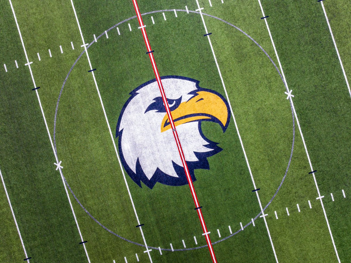 When we replaced the 12 year-old field at Olathe North High School, the community gained something it never had before. 

School name, colors, and mascot stitched into the surface itself, proudly proclaiming Eagle pride.  

Travis Palangi, Executive Director of Facilities &amp;