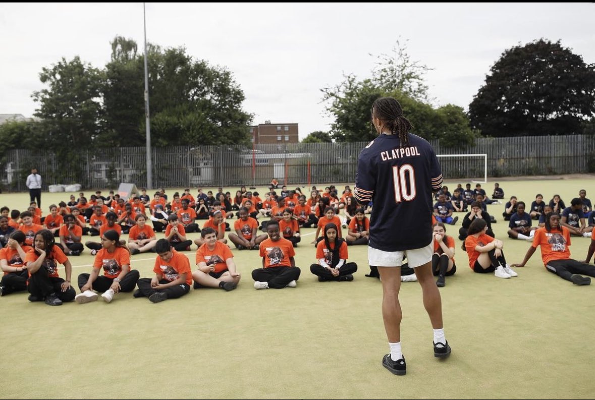RossRead's tweet photo. Chase Claypool had an amazing football event for kids in the UK and wore a football jersey. Where are those shitty aggregator accounts who pushed toxic masculinity and other negative behaviors? https://t.co/uSvgF3RYOU