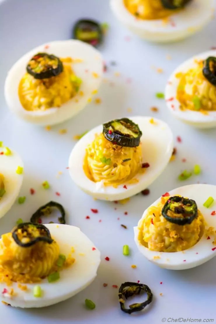 chefdehome's tweet photo. 👉Jalapeno Popper Deviled Eggs
🔗https://t.co/Sz65DARYTq
These spicy #deviled #eggs are bursting with flavor and heat of two kind of jalapenos, pickled and roasted, and have filling of cream cheese and feta to balance the heat! These look scrumptious and taste amazing,. https://t.co/cICwuSto3h