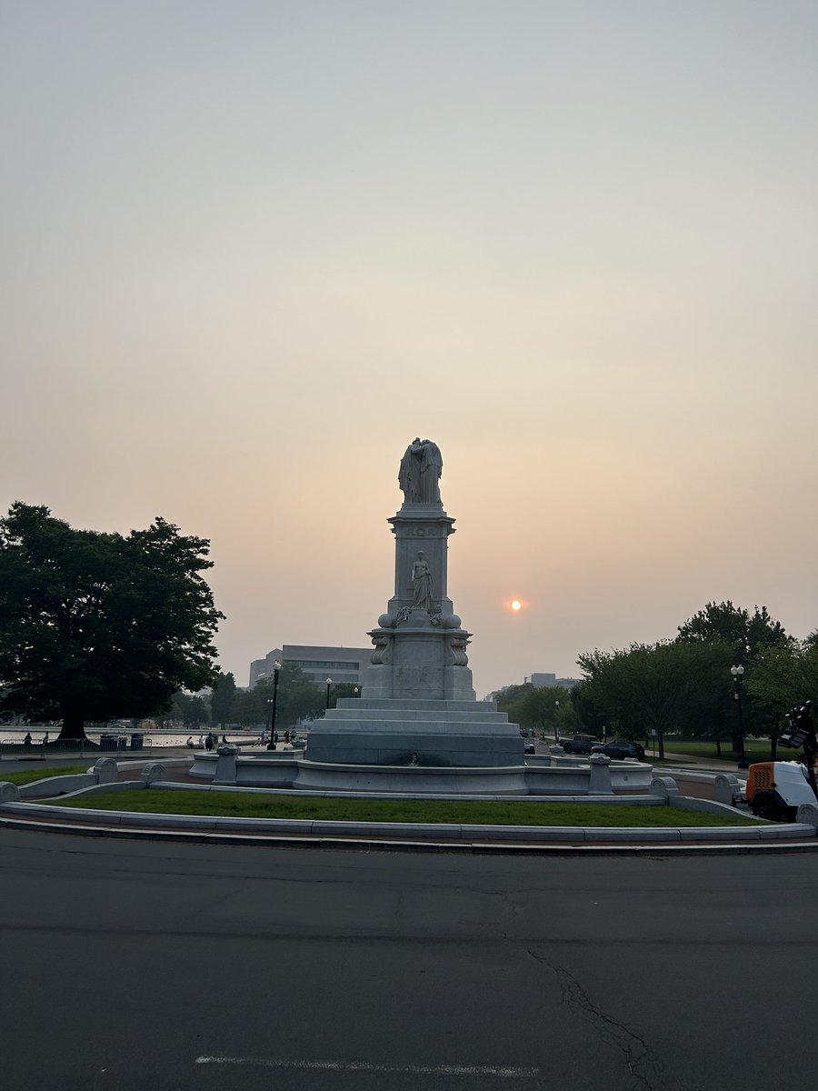 Hazy view toward the National Mall in #WashingtonDC — and the Peace Monument — as seen from the steps of the U.S. Capitol. #WildfireSmoke has been very evident all day. In the foreground: Preps underway for #July4th concert. #DCwx <a href="/spann/">James Spann</a>