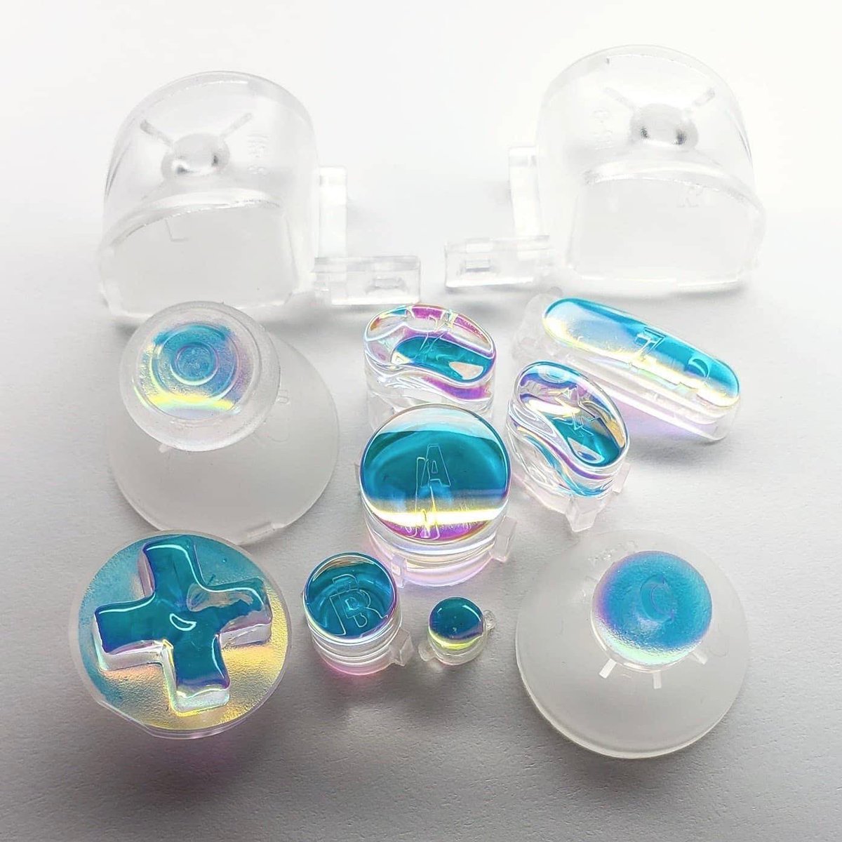 ❗️DICHROIC BUTTONS GIVEAWAY❗️

- Retweet and follow @dafunkgaming for a chance to win a set of Dichroic buttons &amp; sticks for your GameCube controller! 

- They’re also back in stock on my shop dafunkgaming dot com 🙌

- Winner will be picked July 10th at 7pm EST