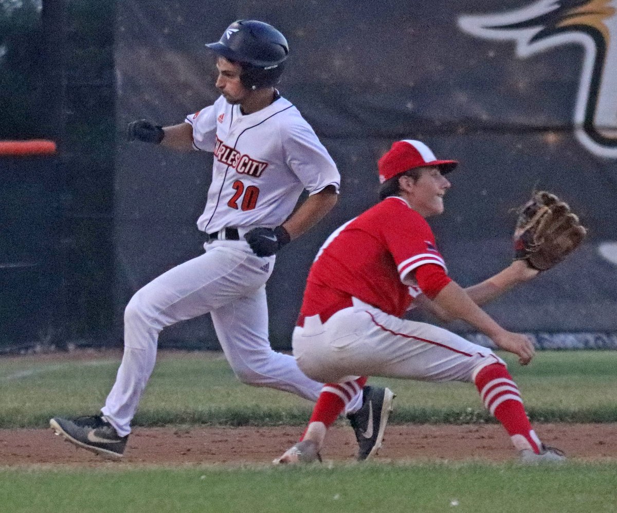 Charles City senior Zach Chambers heads into third base with a standup triple as Saint Ansgar's Connor Mullenbach takes a late throw during Thursday's non-conference game, which the Comets won 16-6.
…citypress-ia-siteadmin.newsmemory.com/charlescitypre……f-regular-season/