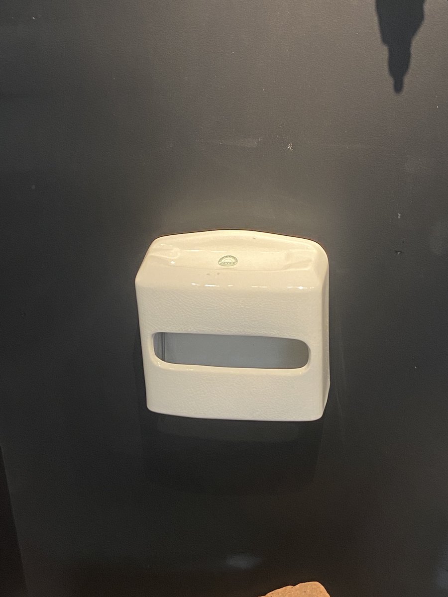 In the 20th century, smoking on the loo was a fine way for a man to take a few minutes for himself - so this ceramic toilet paper dispenser has an ashtray. 🧻

These days dispensers might come with a convenient shelf to hold that all-important mobile phone.

📸: Trevor Kennedy