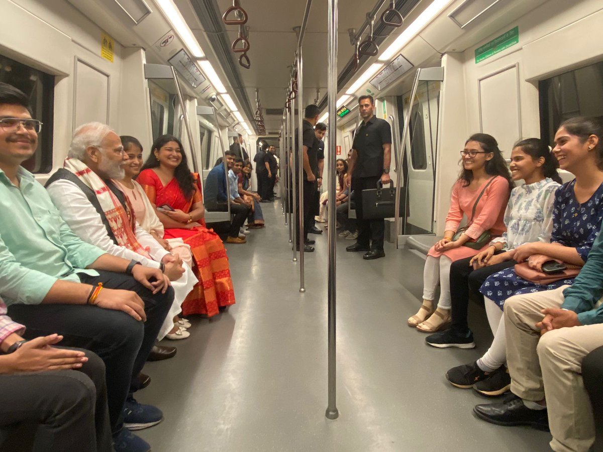 #InPics | Indian PM #NarendraModi travels to Delhi University in #metro rail