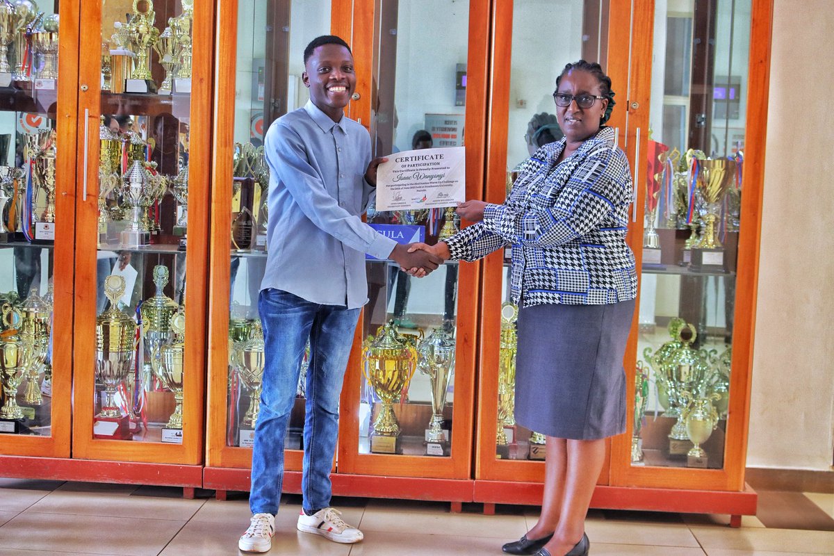 ZetechModel's tweet photo. Grateful to have received our Warm Up Challenge Participation Certificates from the esteemed Dean of Students.  It's a proud moment for our team as we continue to strive and excel together. Cheers to the power of participation and camaraderie! 🎉🏆 #TeamSpirit #WarmUpChallenge https://t.co/aZF850nleK