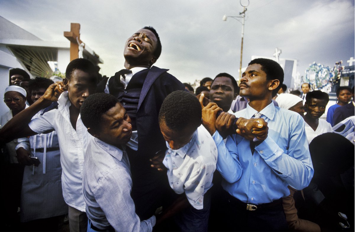 The VII Foundation (@viiphoto) on Twitter photo "See Through the Noise"—the 1st collective #exhibition by <a href="/VIIPhoto/">The VII Foundation</a> in #Arles, July 6
Maggie Steber/VII
Mother’s Funeral: A young Haitian man writhes in grief at the funeral of his mother in Haiti’s National Cemetery as his family and friends try to hold him back from the coffin. "See Through the Noise"—the 1st collective #exhibition by <a href="/VIIPhoto/">The VII Foundation</a> in #Arles, July 6
Maggie Steber/VII
Mother’s Funeral: A young Haitian man writhes in grief at the funeral of his mother in Haiti’s National Cemetery as his family and friends try to hold him back from the coffin.