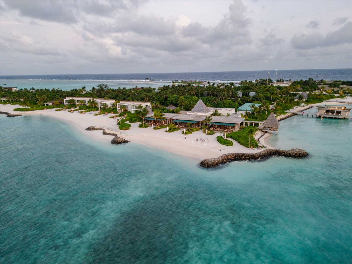 Feast your eyes on the stunning aerial view of our restaurant, where culinary delights meet the turquoise waters of Maldives. 🌊🍽️✨   #AerialDining #MaldivesEats #RestaurantViews #OceanfrontDining #CulinaryParadise #Maldives #MaldivesResort #Resort #KudaVillingiliResort
