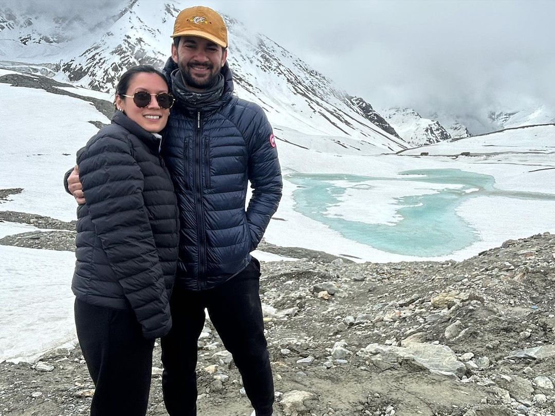 #KaranDeol shared some beautiful memories from his recent trip with wife #DrishaAcharya and family and captioned the photodump as 'Love, Laughter, and Fond Memories.'