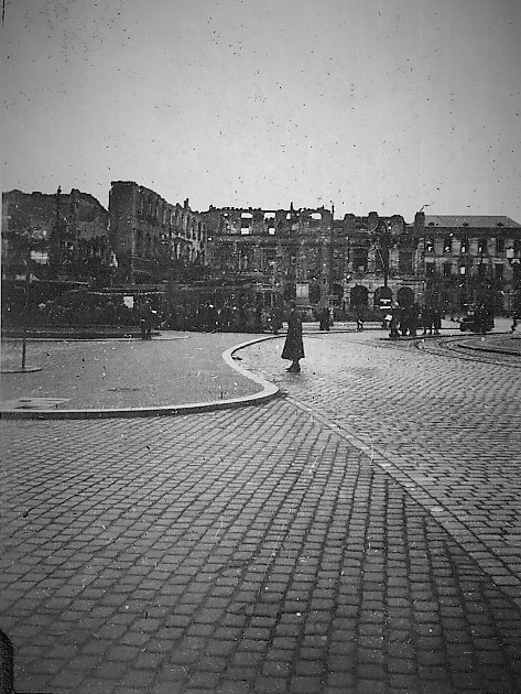 My dad visited Frankfort Germany, seen here is the post war year of 1946 his picture.

Bombed out buildings in the background and what appears to be street cars or the European equivalent in the foreground.

Dad was part of the 86th U.S. Army as a PFC.