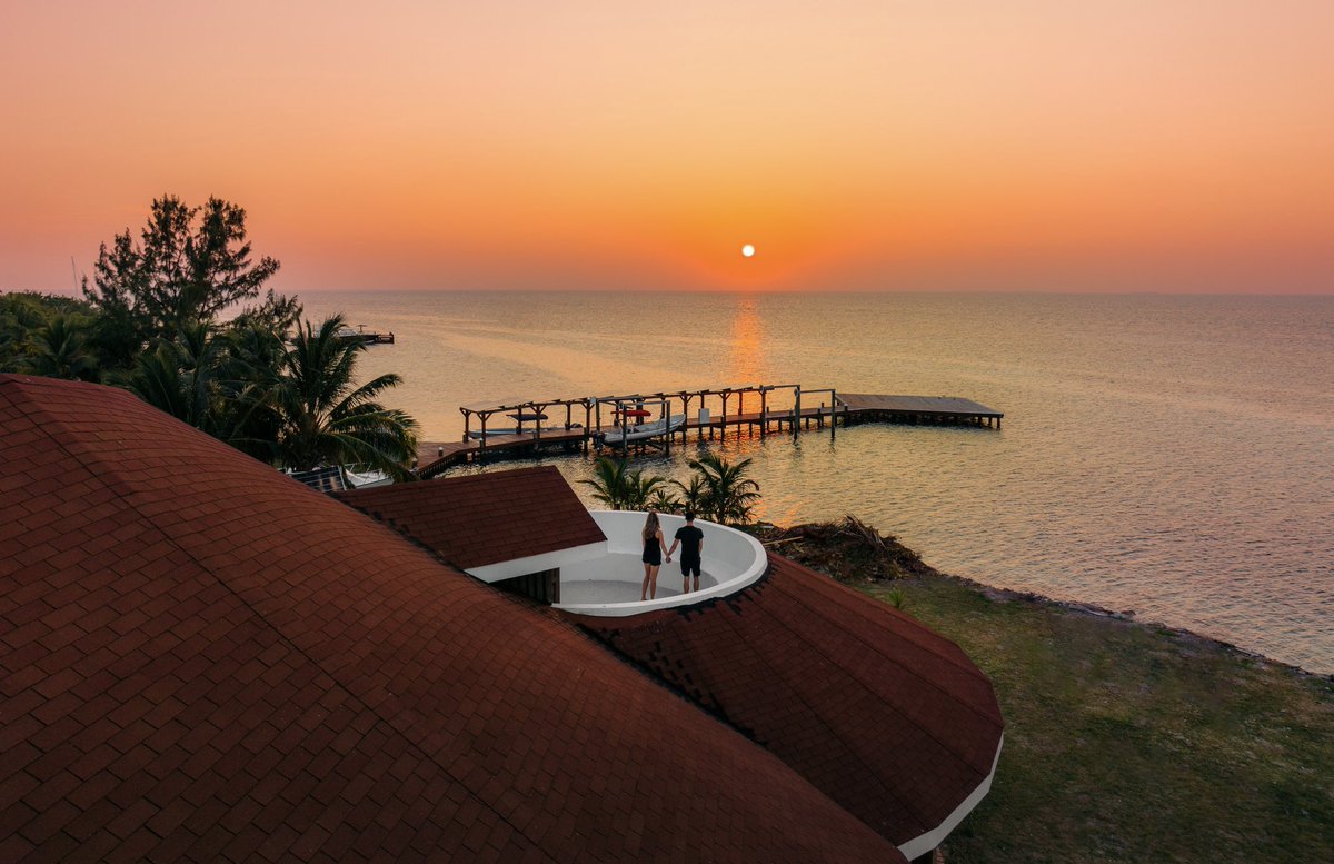 raycayebelize's tweet photo. When it comes to magical island sunsets, Belize does not disappoint! The Cove serves up a perfect spot to catch this picture-perfect view 🌅 🧡 https://t.co/8ZJAL8DwL0