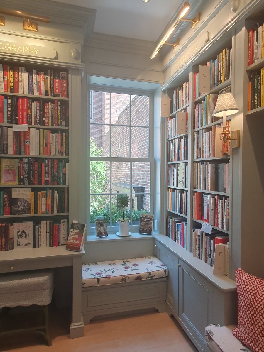 ShreetaShah's tweet photo. Had such a wonderful time travelling around the US east coast the past few weeks. A highlight was Boston's Beacon Hill Books, which had me with the glorious window seat/reading nook – but then I saw the display of miniatures with a tiny flickering fireplace....! 🙀 https://t.co/VFJimXABif