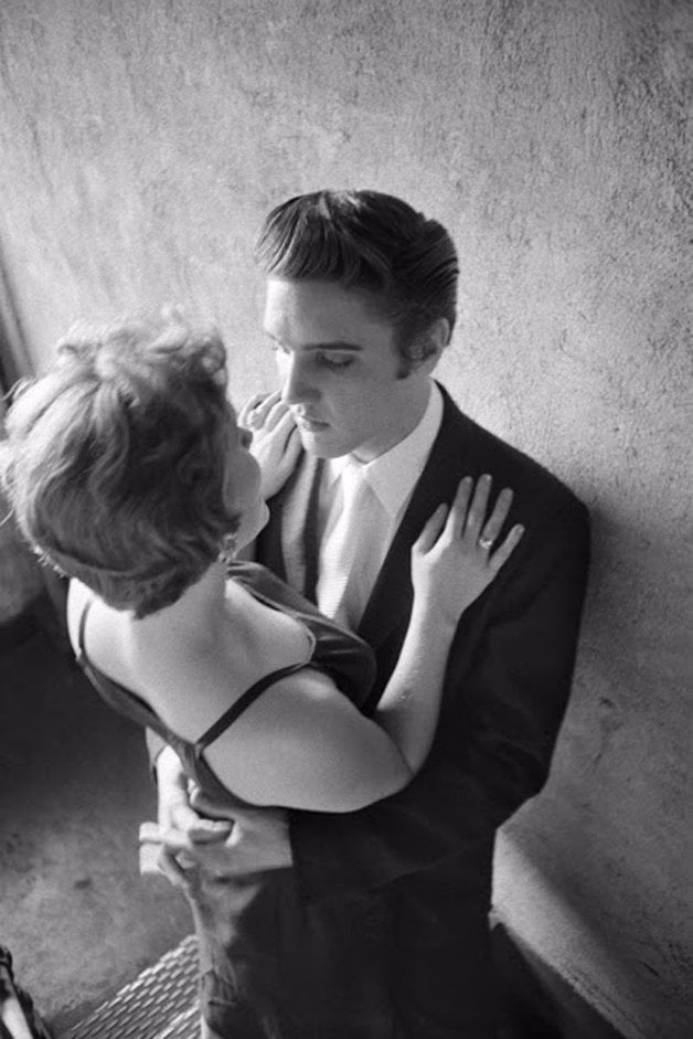 midnightmarvl's tweet photo. friendly reminder that these pictures from this iconic "kiss photoshoot" of elvis presley and barbara gray in the stairwell were taken 67 years ago today. https://t.co/oj30gcXR2L