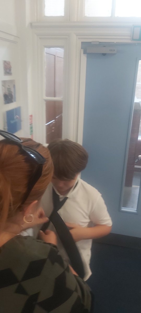 We have an amazing staff team.  Preparing our children for secondary school.  Learning how to fasten a tie.  Life skills!