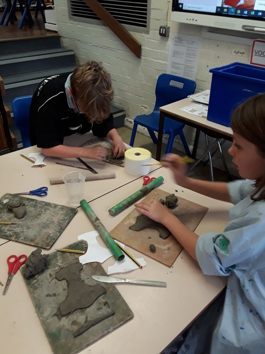 HartestSquirrel's tweet photo. This week Squirrel Class have been designing their own 'Thor's Hammer' in their artbooks, then sculpting them in clay @HartestPrimary https://t.co/db092SbhmD