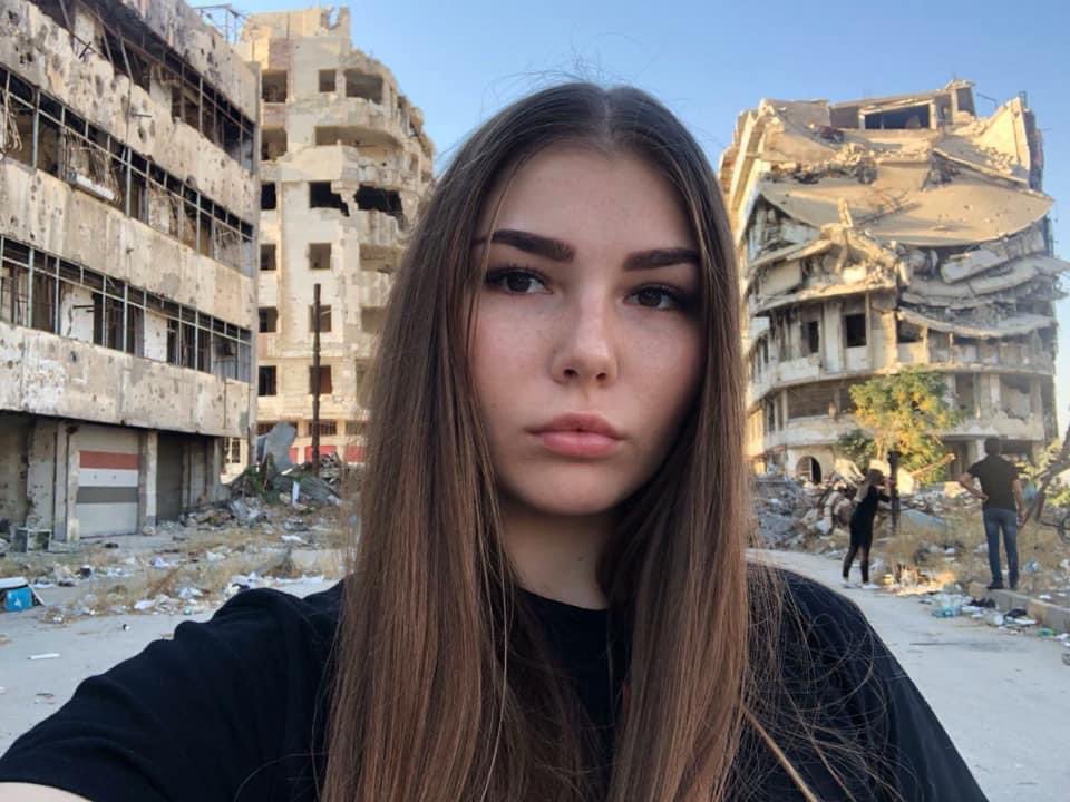 On the right is a picture of a Russian girl who visited the city of #Homs after it was destroyed by Bashar al-Assad and Putin, causing the death and displacement of its people. This girl went there to take some pictures with the devastated homes, knowing that beneath each house a…