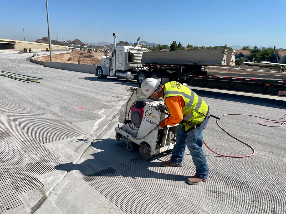 ArizonaDOT's tweet photo. GROOVY! Workers with the I-10 BWC Project used a saw to cut grooves into the concrete on the new bridge connecting WB US 60 to WB I-10. The grooves improve skid resistance of the driving surface which helps to prevent hydroplaning.

#StayAheadOfTheCurve at https://t.co/9RToV9jv5l https://t.co/pI9gMAk7KS