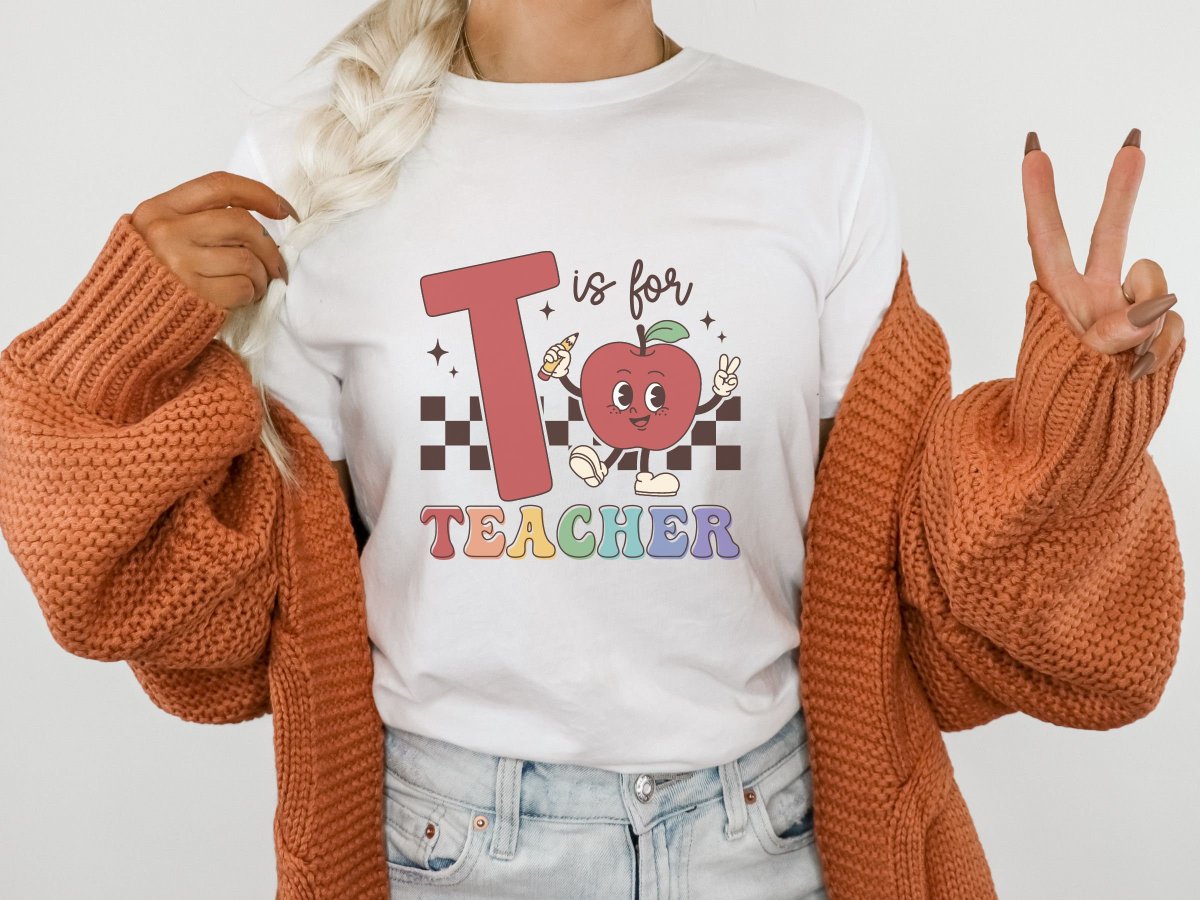 KayceeHumphre10's tweet image. Excited to share the latest addition to my #etsy shop: T is for Teacher Apple Retro Cute Teacher School Shirt Soft T Shirt etsy.me/3PGlm5Z #teachergift #schoolgift #teacherappreciation #backtoschoolgift #schoolshirt #teachershirt #funnyteachershirt #teachingshi