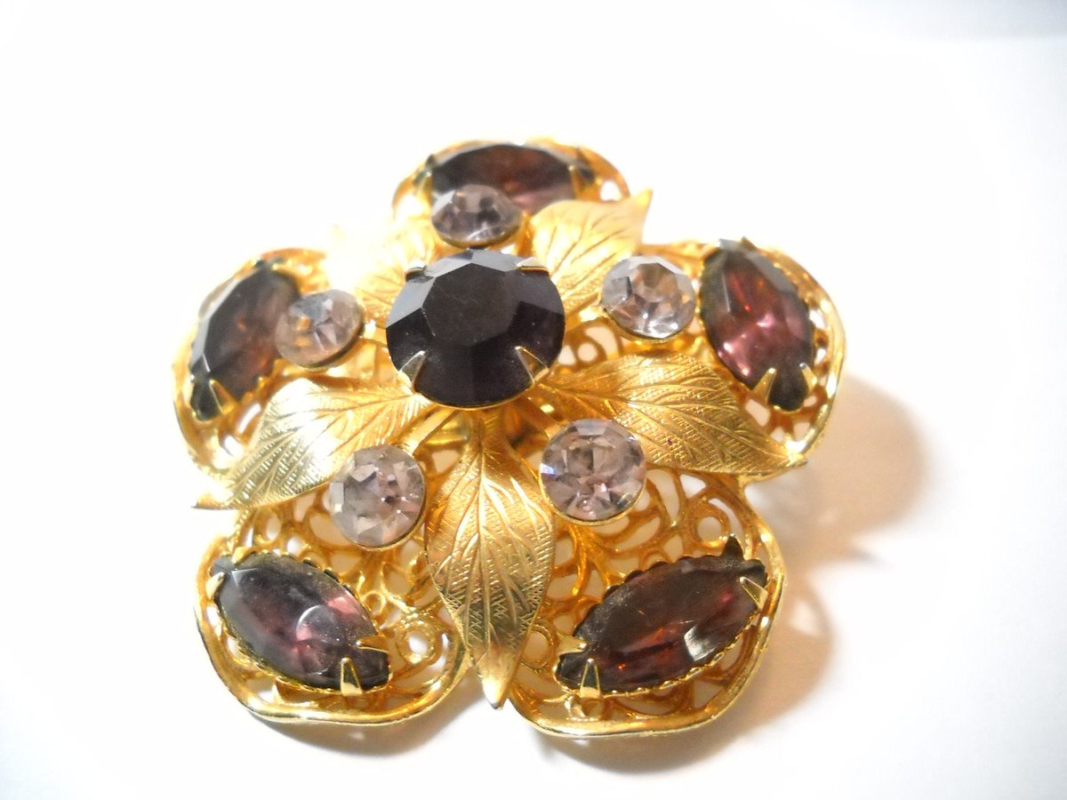 find_charlotte's tweet photo. Excited to share the latest addition to my #etsy shop: Vintage Amethyst Rhinestone Brooch Layered Filigree Gold Metal Flower Brooch Light Lavender Rhinestones Mid Century Hollywood Regency https://t.co/9NRVZDILCG #purple #wedding #christmas #floral #unisexadults #midce https://t.co/xuLMUUuQfo