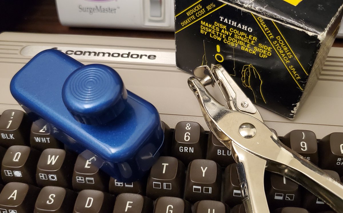Well, i've never owned one, but got me a disk notcher for $12. Probably won't use it much, as i am still partial to my mom's old round paper punch i've used since the mid 1980's (there on the right), but i thought i'd join the Dark Side, if even only just to have it on the shelf.
