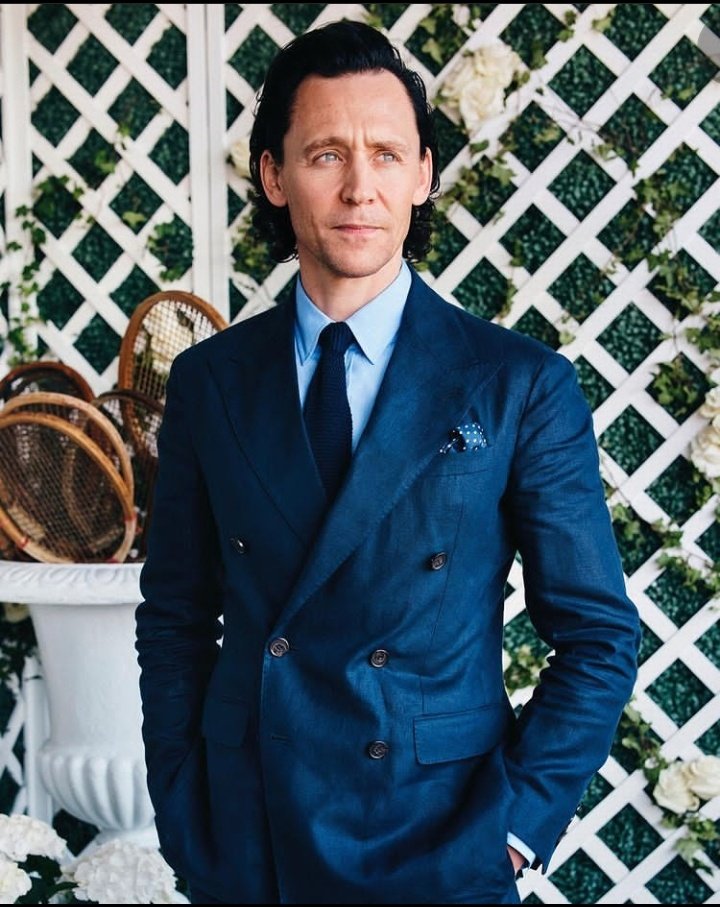 Tom Hiddleston at Wimbledon in 2022 with the dreamiest eyes you've ever seen